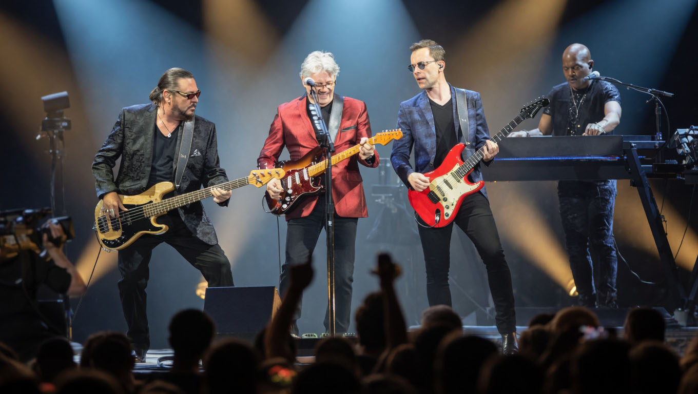 Kenny Lee Lewis on stage with the Steve Miller Band